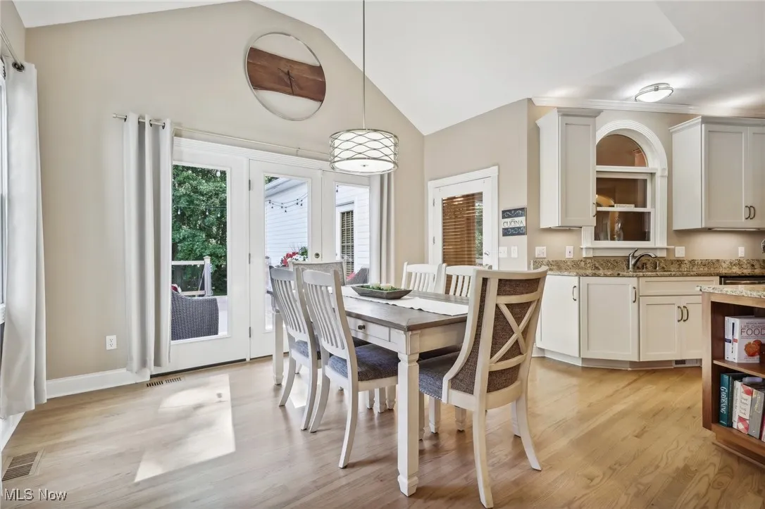Eat in Dinette with Triple French Doors to Rear Deck & Door to Inlaw Suite