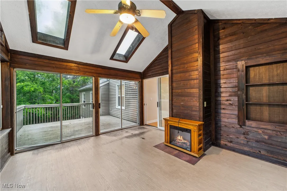 Gorgeous Sunroom with Skylights and tremendous wooded views