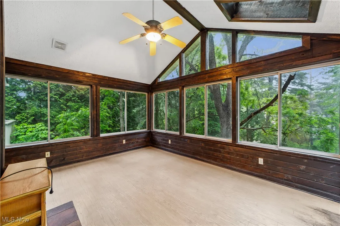 Gorgeous Sunroom with Skylights and tremendous wooded views