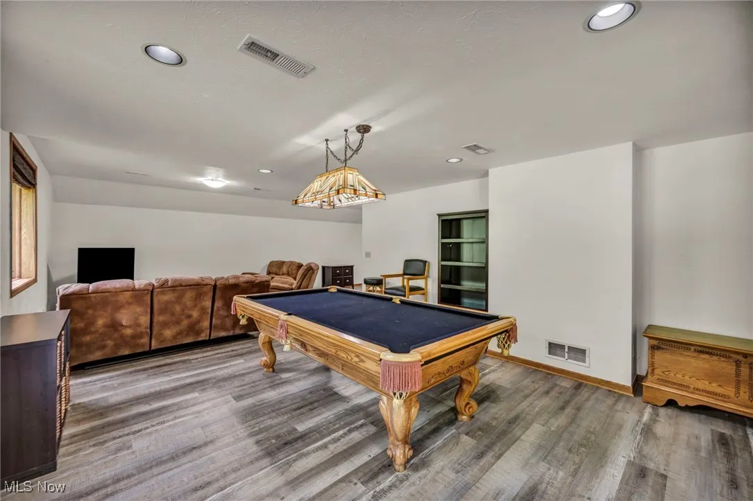 Entertaining area featuring billiards, wood finished floors, and recessed lighting