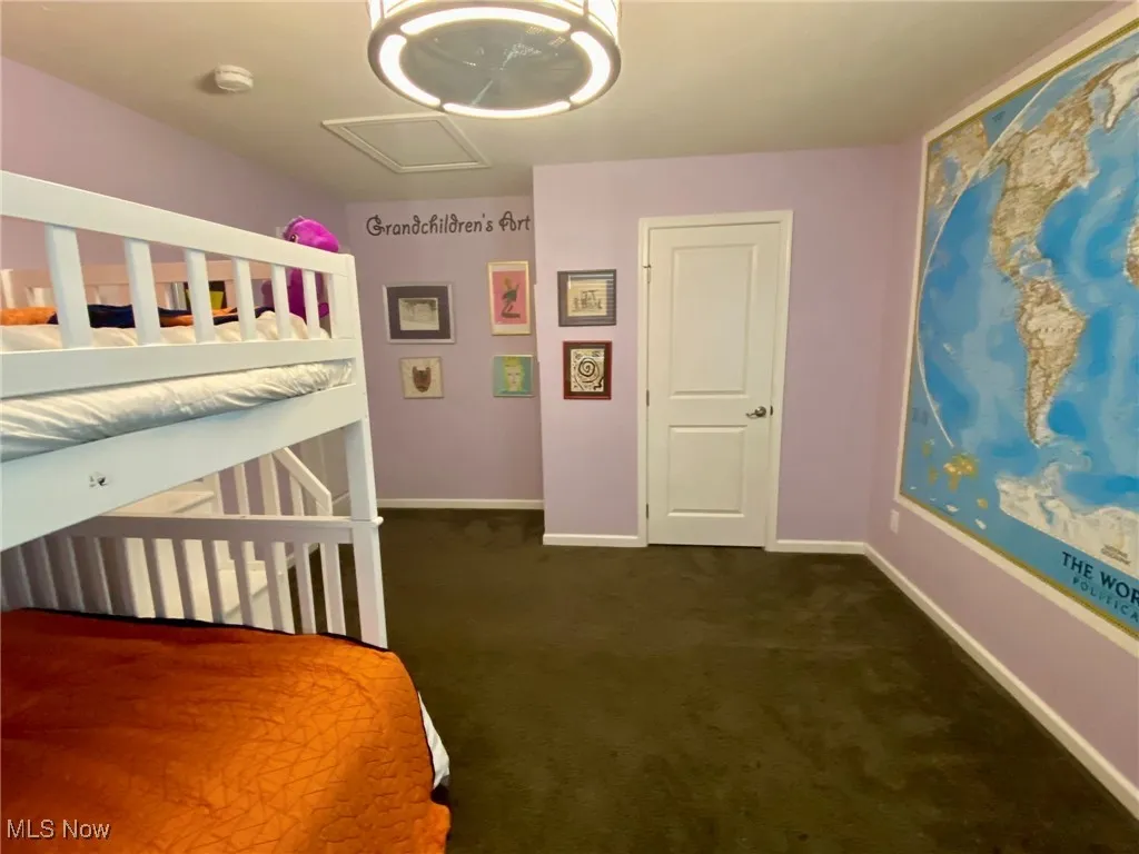 This charming children’s bedroom is designed with both function and fun in mind. A spacious closet offers convenient storage, keeping toys and essentials neatly organized and easily accessible in this cheerful children’s bedroom.