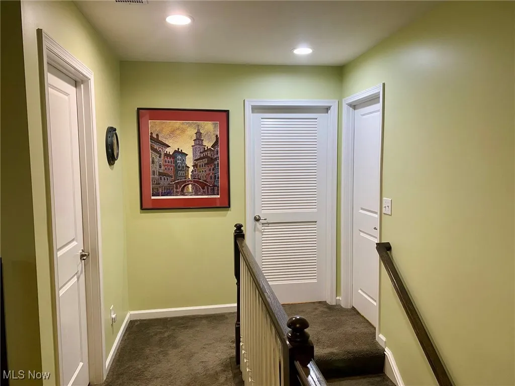At the top of the stairs on the second floor, you'll find easy access to key spaces, including a full bath, the laundry room for added convenience, and a spacious guest bedroom offering comfort and privacy. This thoughtful layout ensures everyone has their own space while keeping the flow of the home practical and well-organized.
