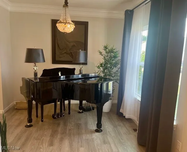 The elegant front room is designed to impress, with specially reinforced floor joists added during construction to support the weight of a grand piano—ensuring both style and functionality. It’s the perfect space to showcase your musical talent or simply enjoy the beauty of this distinctive room.