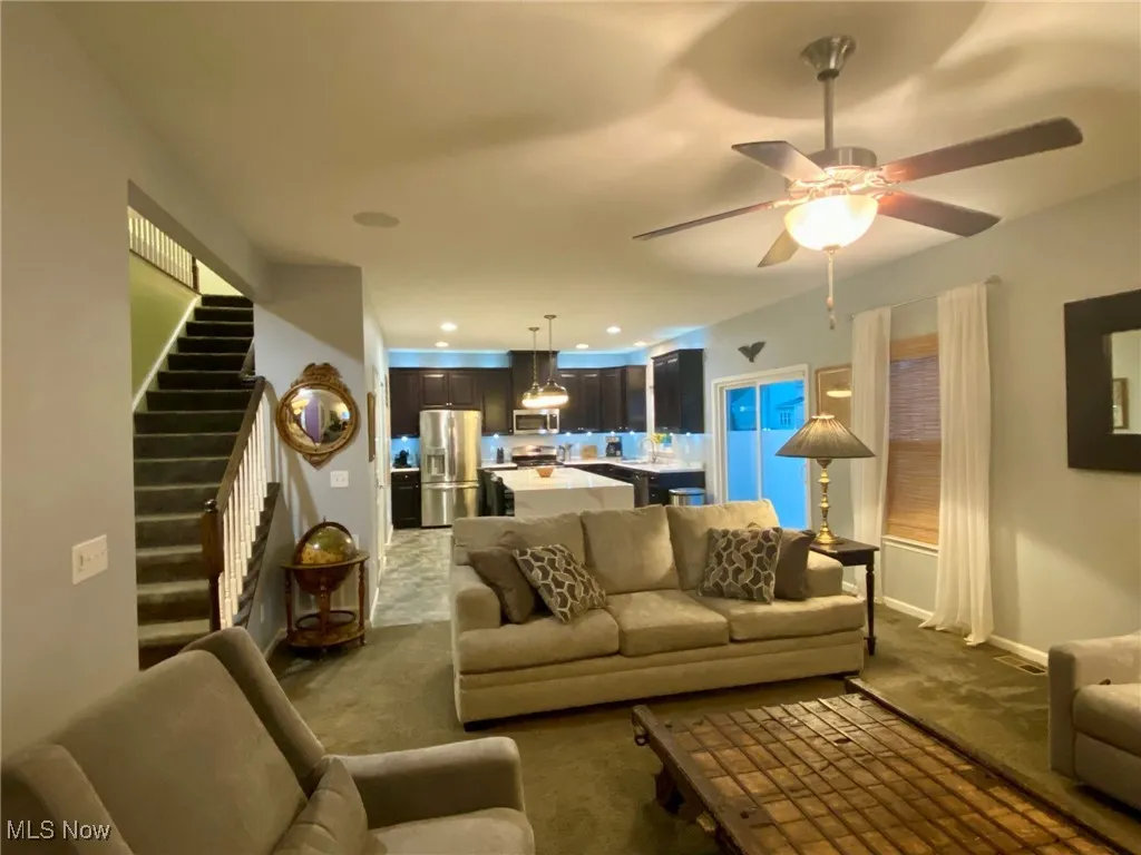 Easy entertaining with open floor plan. Living room open to kitchen and sliding doors to backyard.