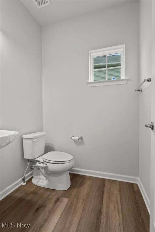 Bathroom with wood finished floors