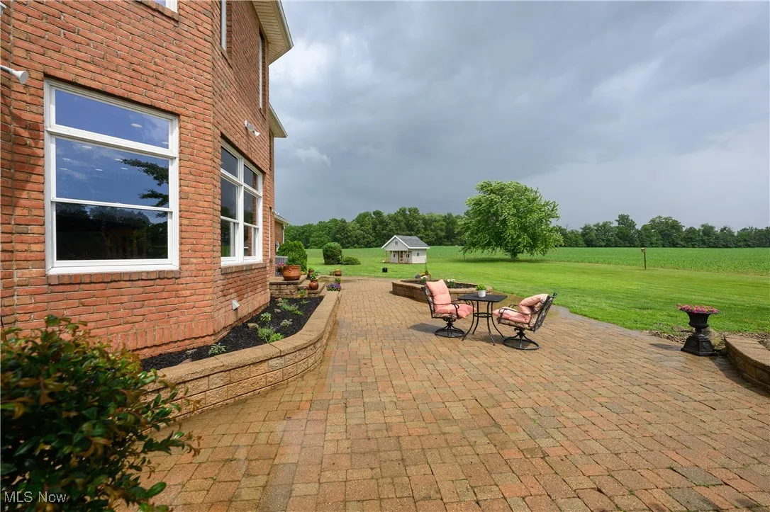 View of patio / terrace with an outbuilding