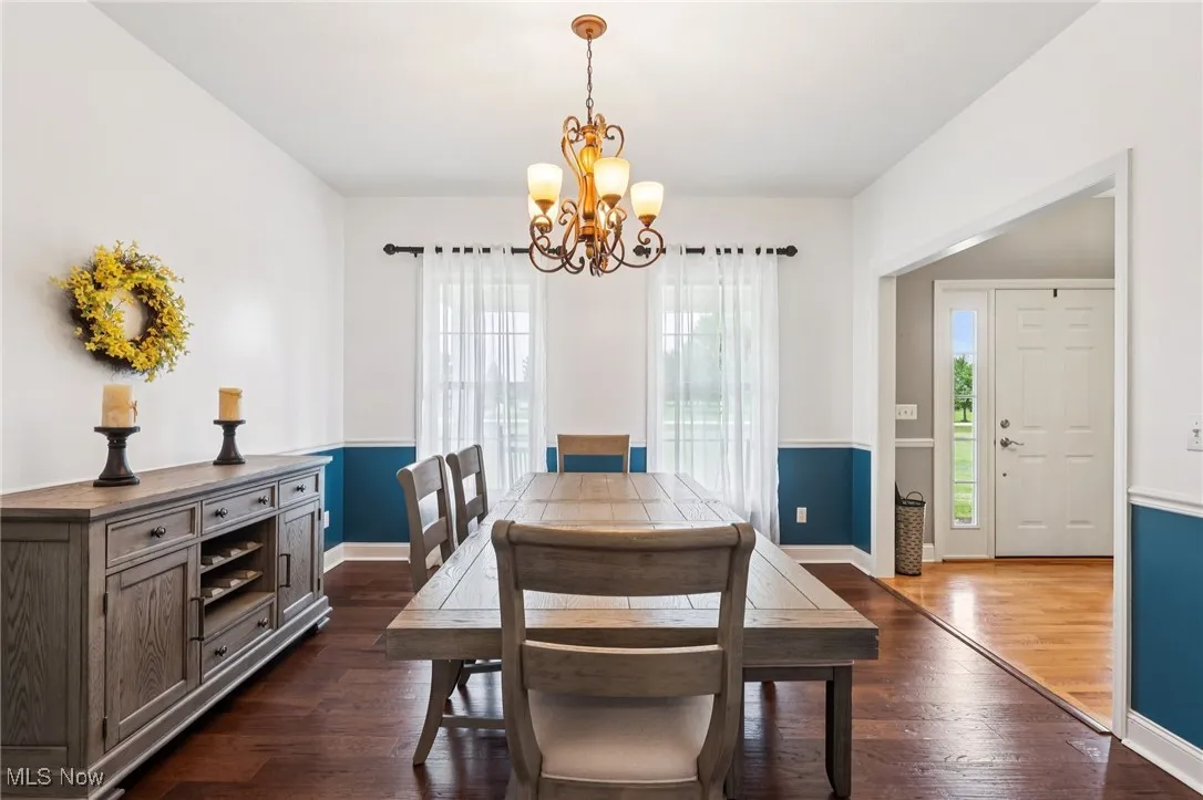 The formal dining room, adjacent to the kitchen.