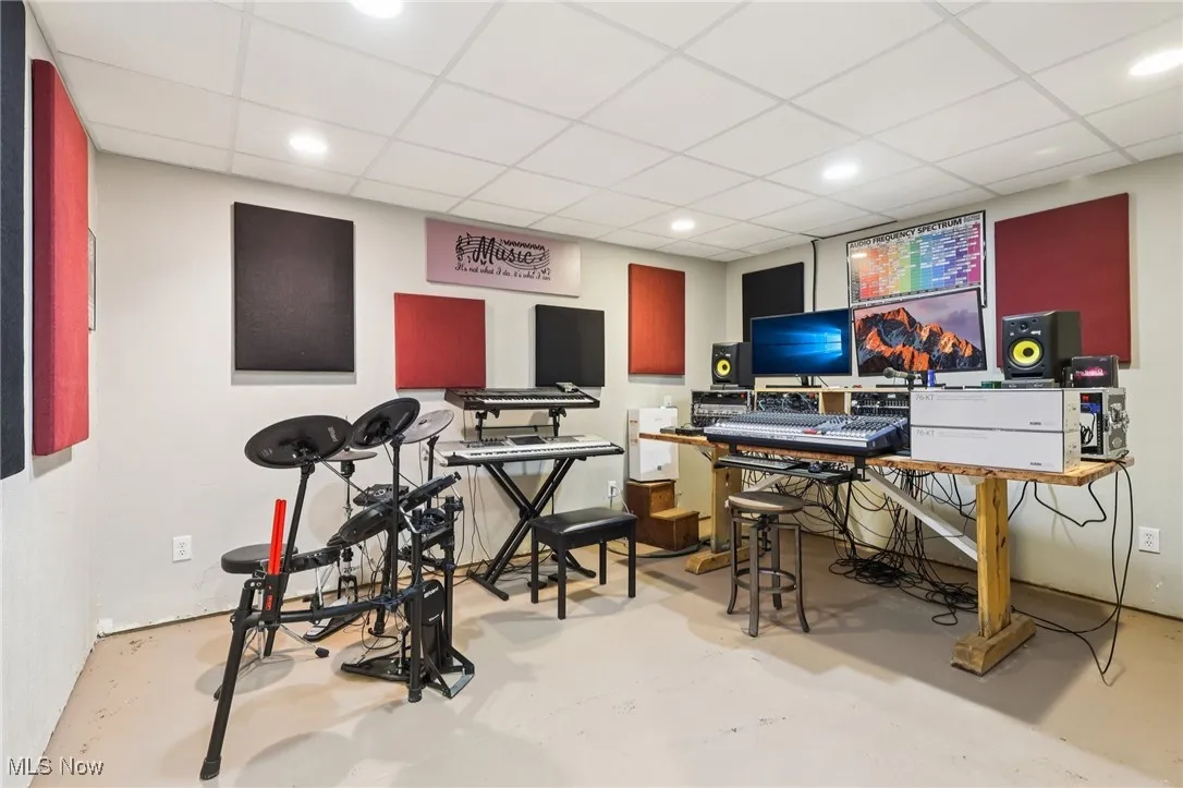 One of two separate rooms in the lower level, currently used for the owner's studio.  Could be used for office or exercise space.