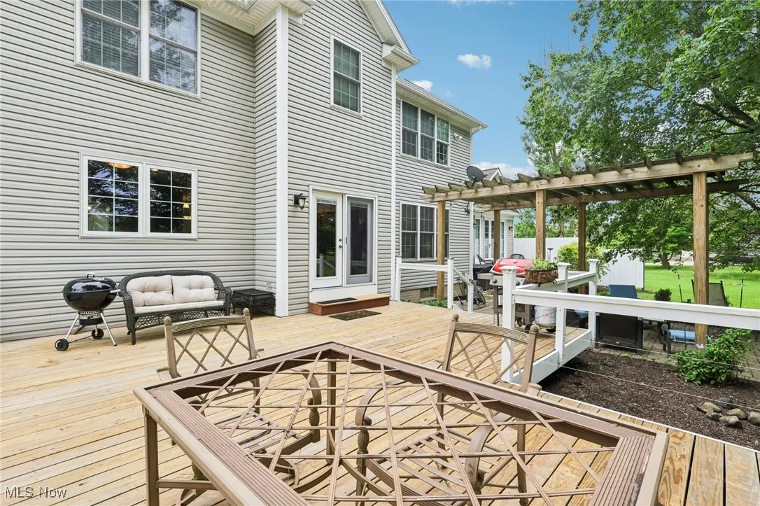 The deck spans the back of the house on different levels.