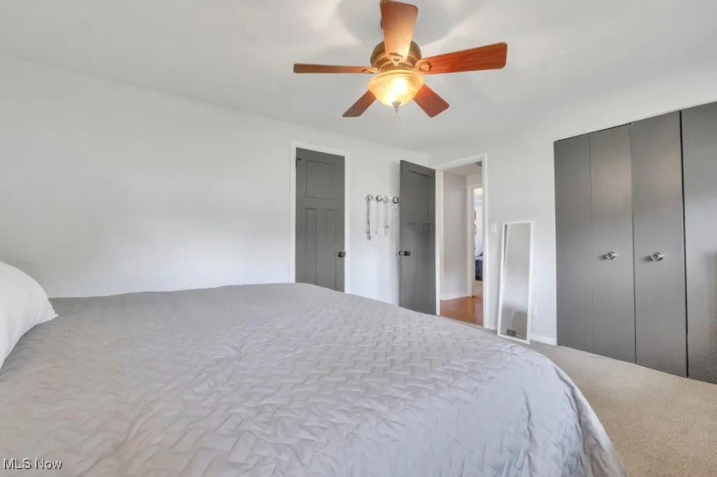 Bedroom featuring a ceiling fan