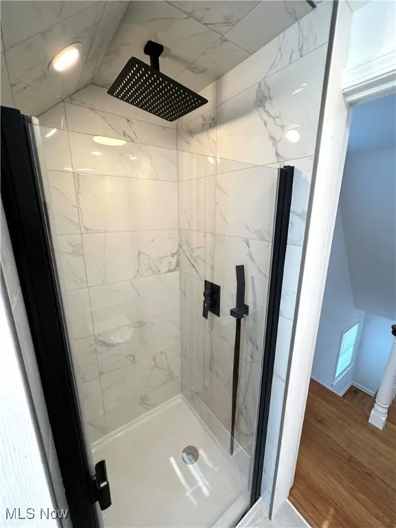 Bathroom with marble finishings, high end rain shower head & new vinyl floors