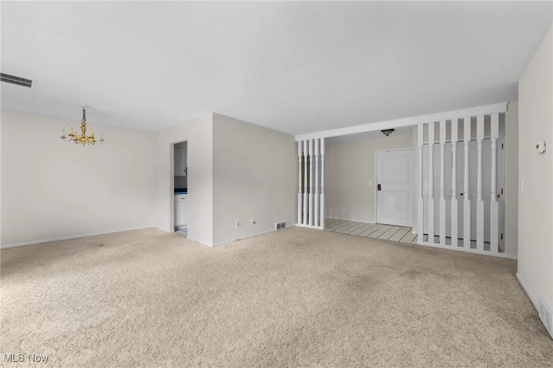 Living room featuring carpet flooring