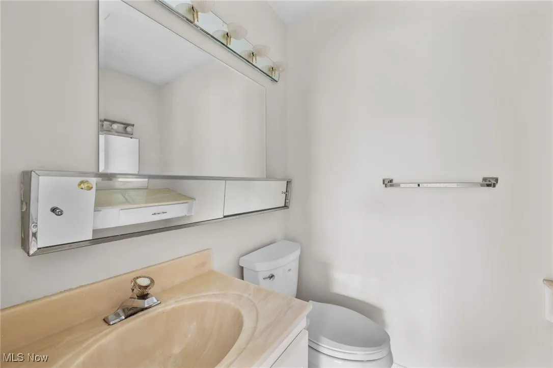 Half bath with toilet and vanity