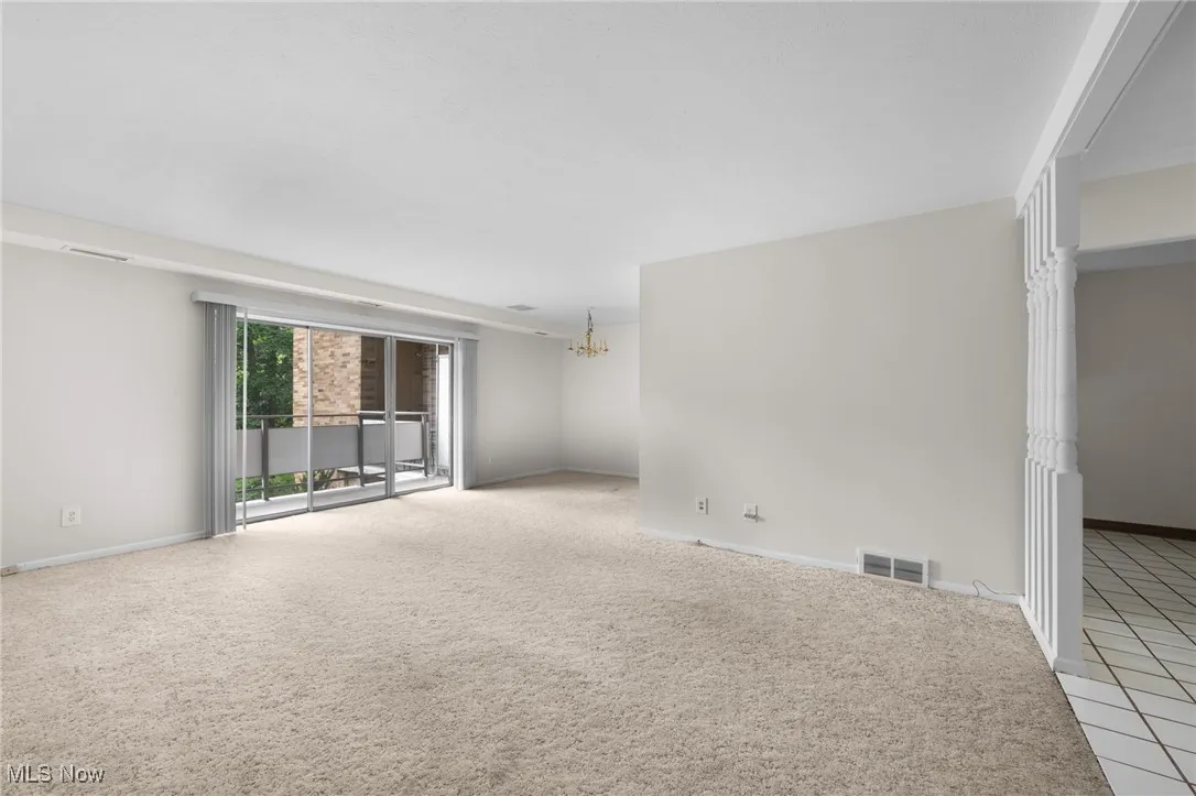 Living room with light carpet