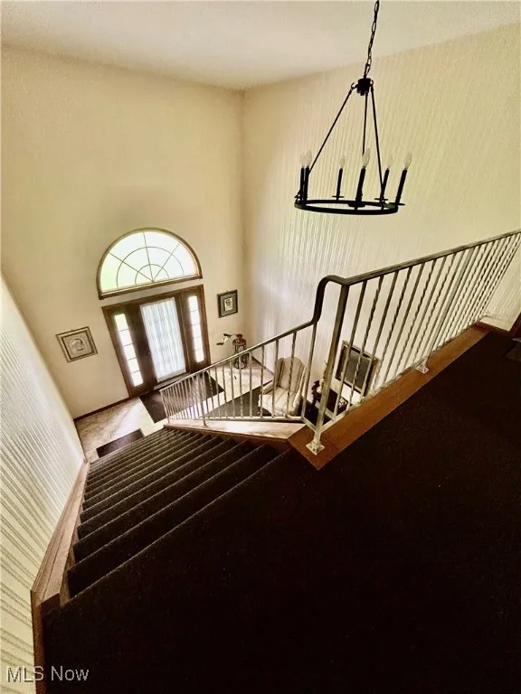 Stairway with a chandelier