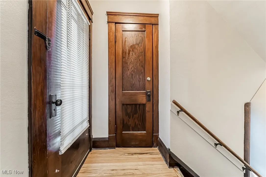 Entryway with light wood-style floors