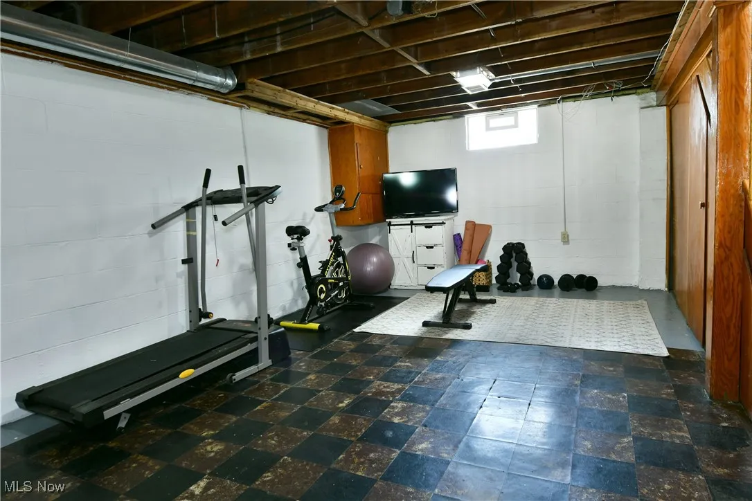 Workout room with concrete block wall