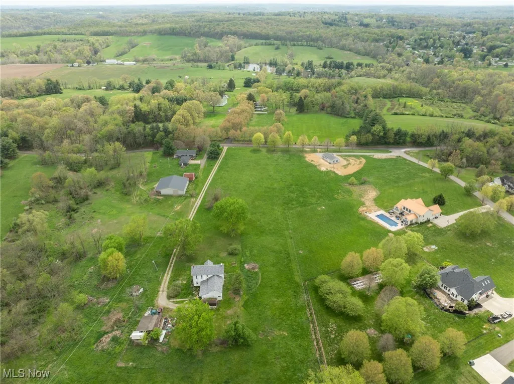 Aerial view of property's location featuring rural landscape