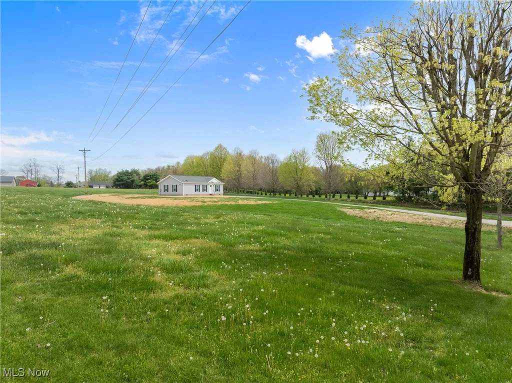 View of grassy yard featuring a view of countryside