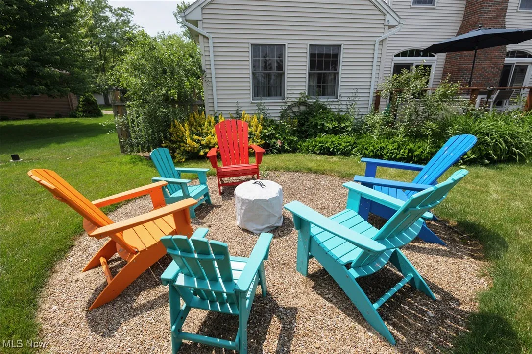 View of patio featuring a fire pit