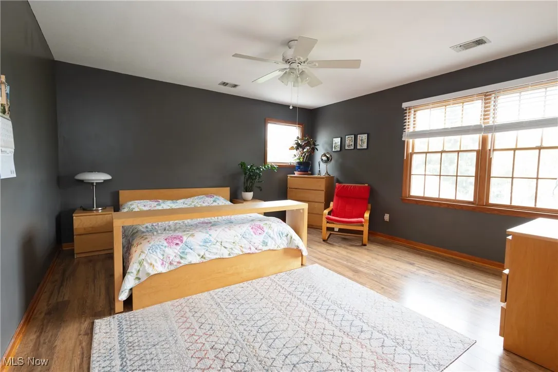 Second fl Primary Bedroom featuring wood finished floors and ceiling fan