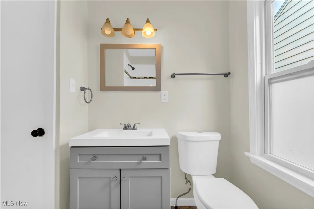 Bathroom featuring toilet and vanity