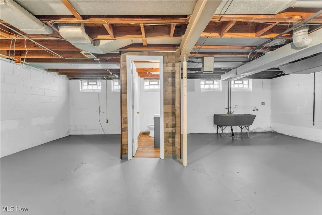Below grade area featuring plenty of natural light