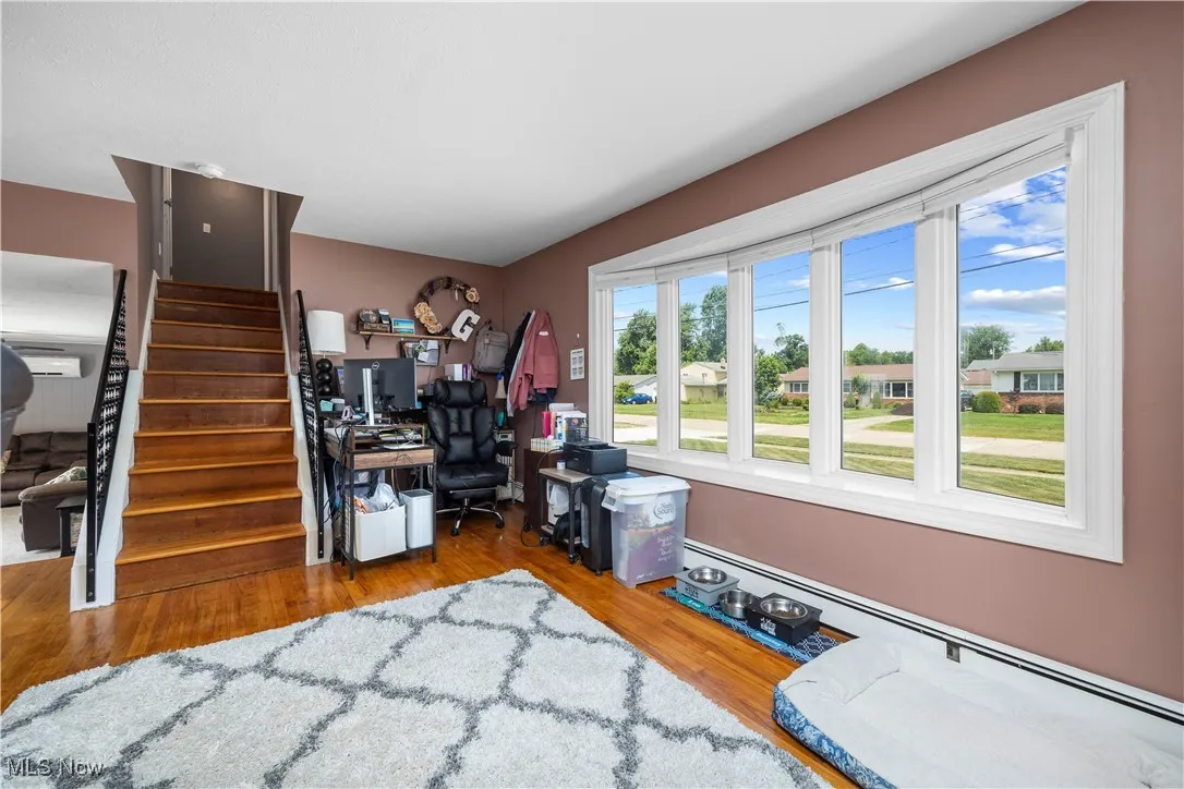 living room currently being used as home office
