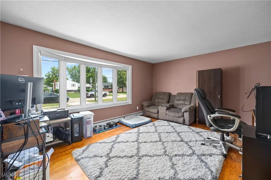 living room currently being used as home office