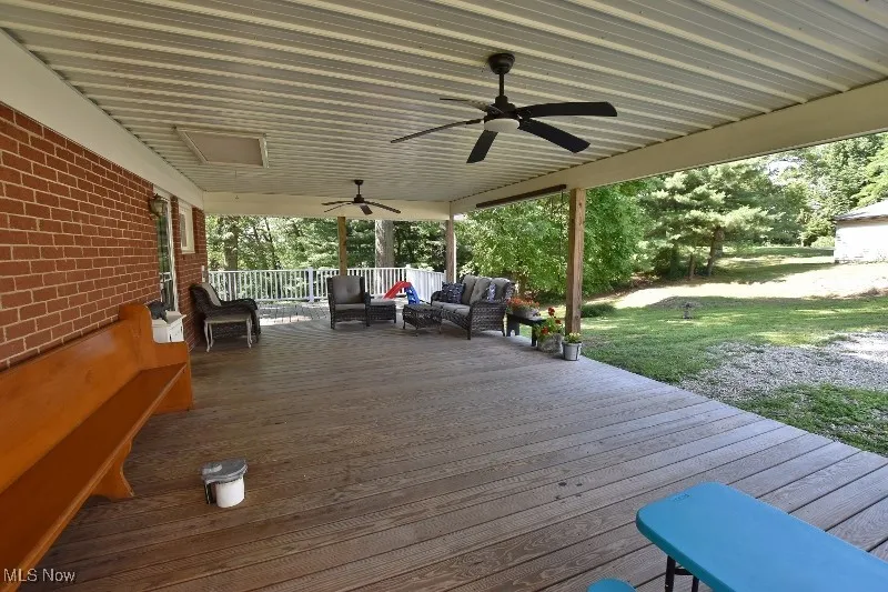 Nice large covered portion of the wrap around deck for outdoor living and entertaining