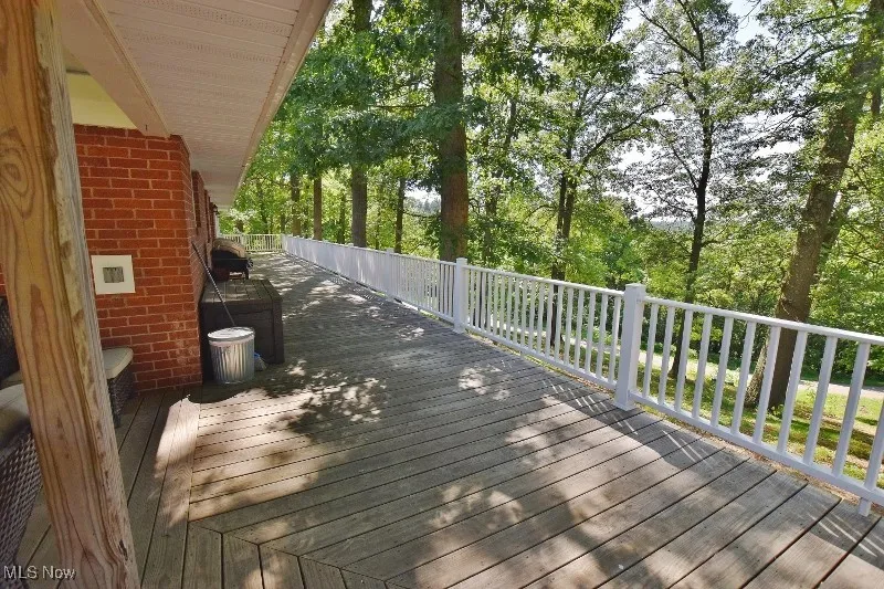 The open part of the deck runs the entire length of the house.