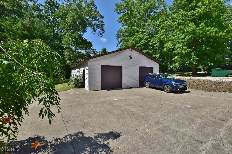 This 32x48 finished heated garage is conveniently located closest to the house.