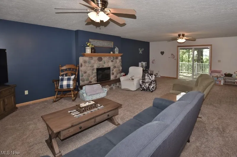 Patio doors lead from the living room to the front deck