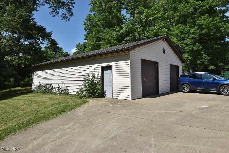 A view of the garage from the covered porch