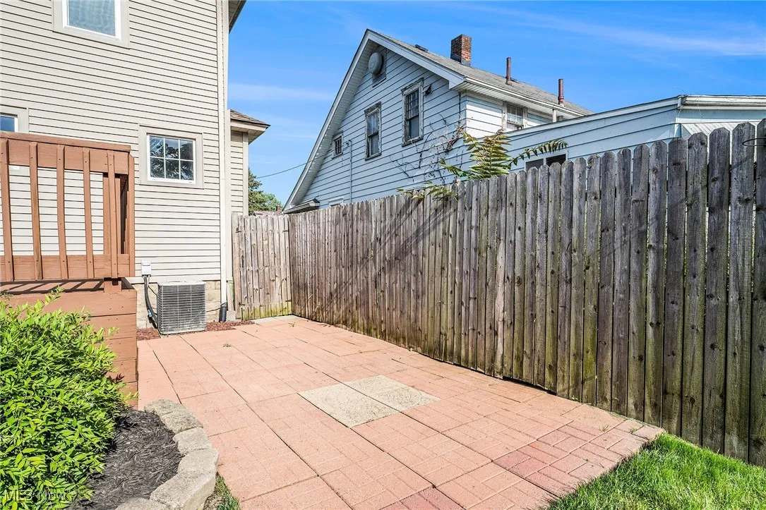 Fenced backyard featuring a patio area