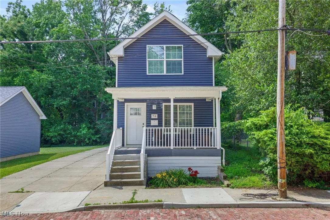 View of front of house with covered porch