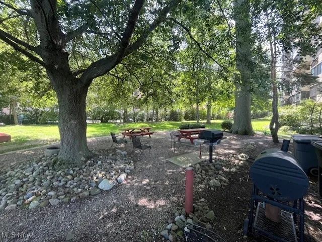 View of home's community featuring a lawn
