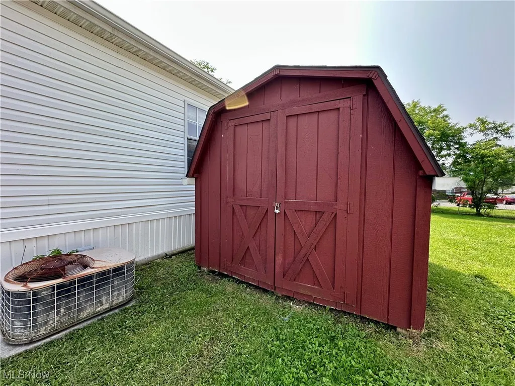 View of shed featuring central air condition unit