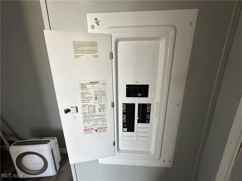Utility room featuring electric panel