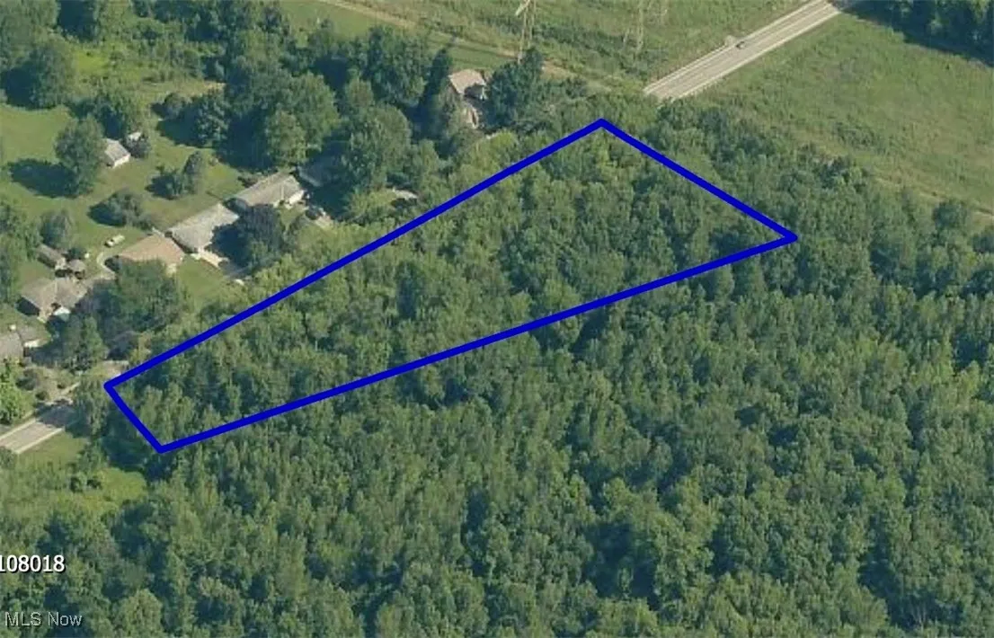 Aerial overview of property's location featuring property boundaries highlighted