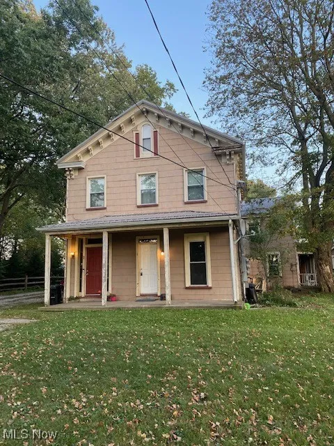 View of front of house featuring covered porch