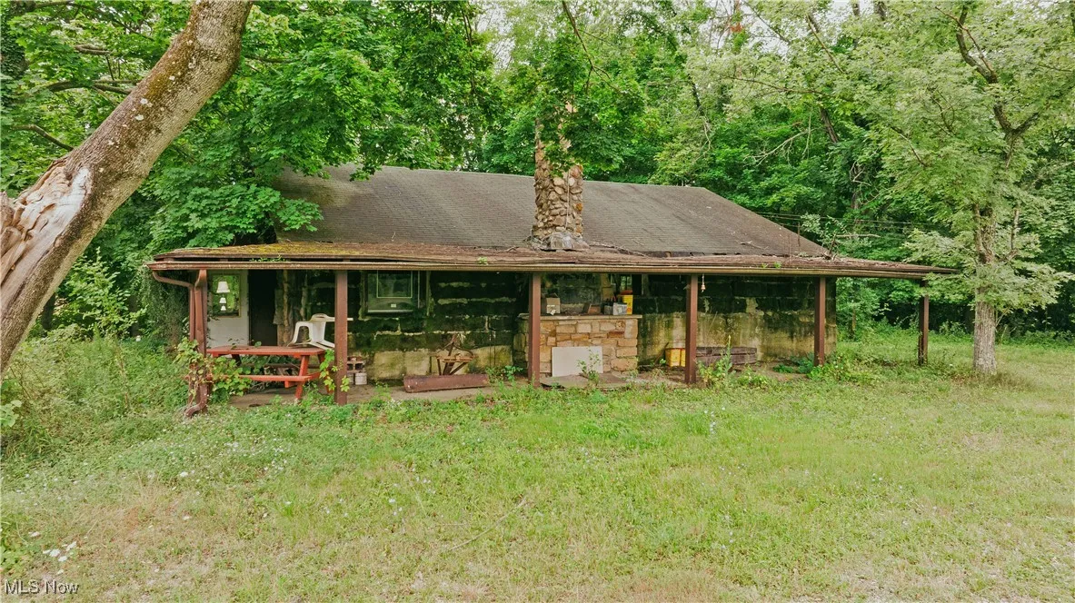 View of front of property with a front yard