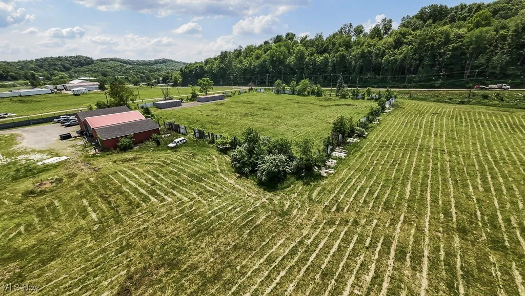 View of rural area featuring large plots for crops
