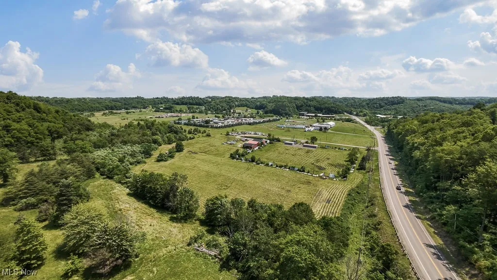 Aerial view of sparsely populated area featuring abundant farmland