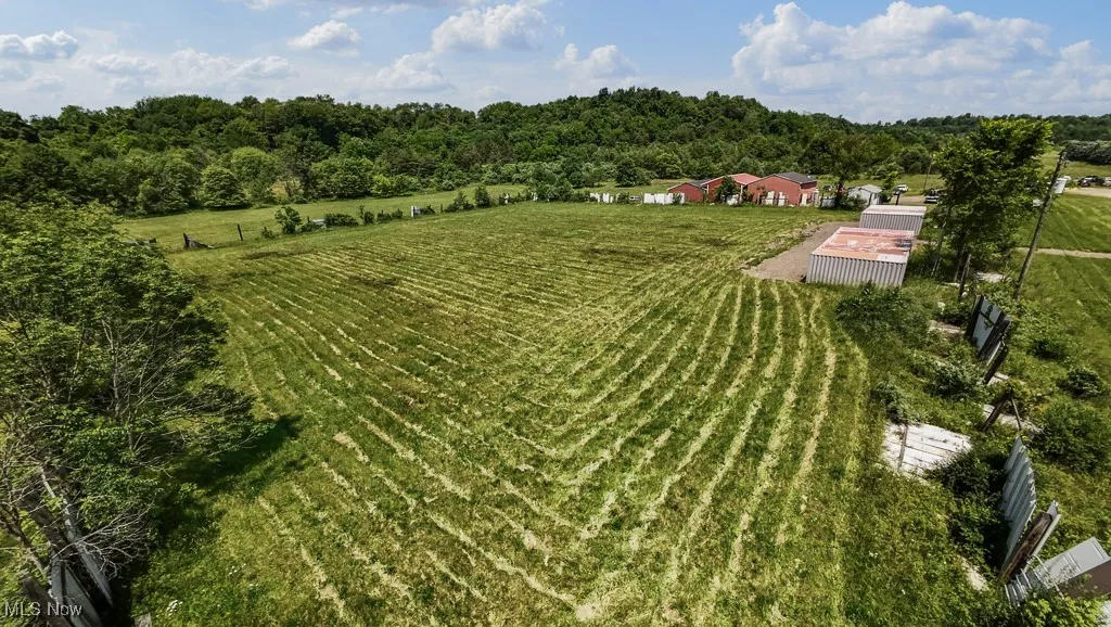 Aerial view of sparsely populated area featuring farmland