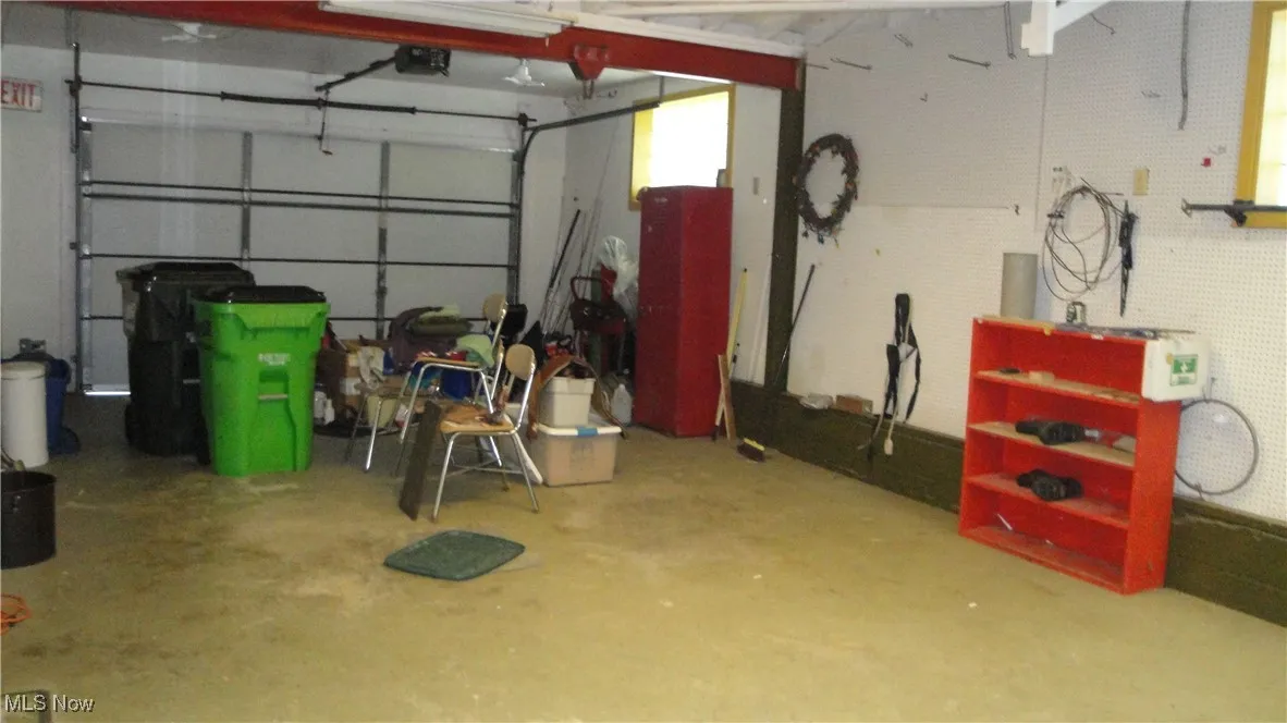Garage featuring a garage door opener