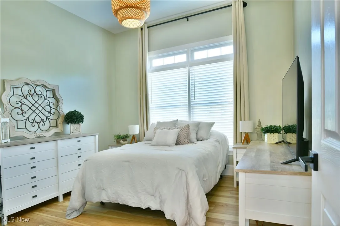 Bedroom with light wood-type flooring