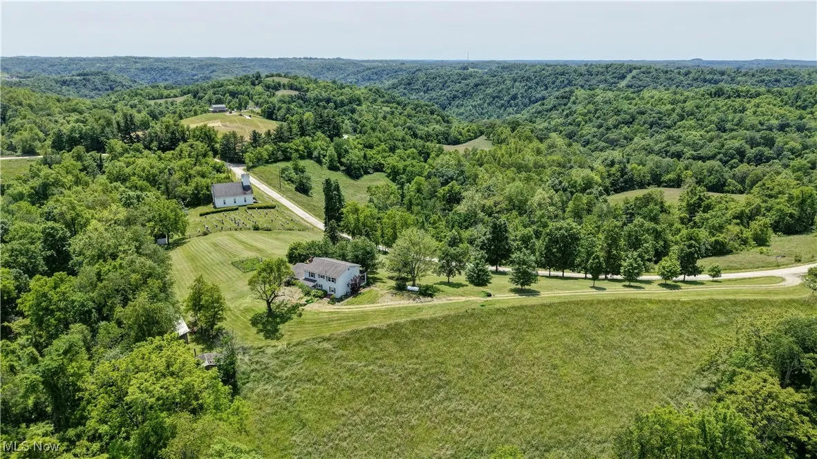 Drone / aerial view of a heavily wooded area