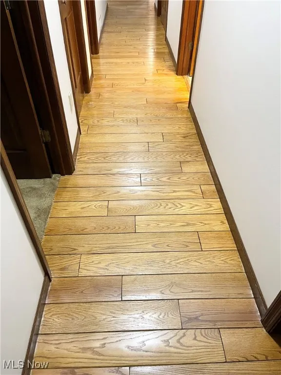 Hardwood floors in halls and Family room