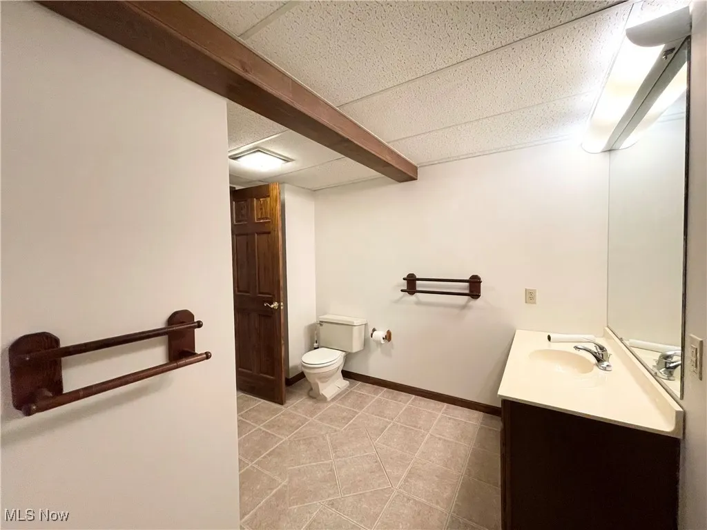 Full bath in lower level just steps from back porch/yard